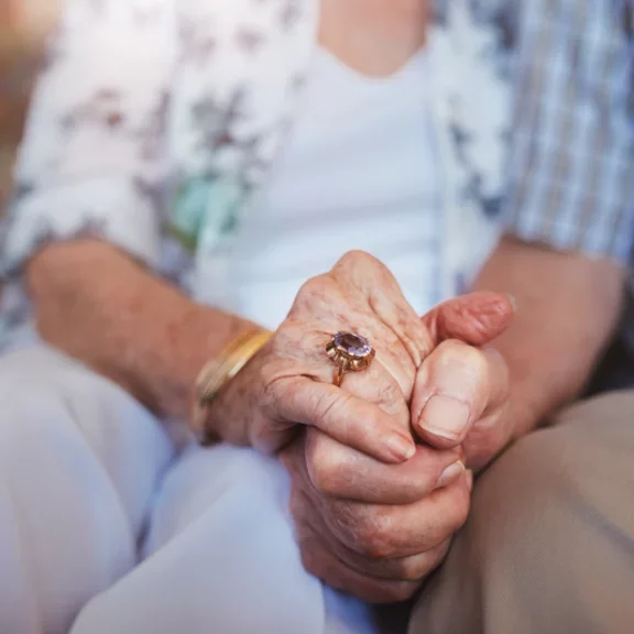 patients joining hands